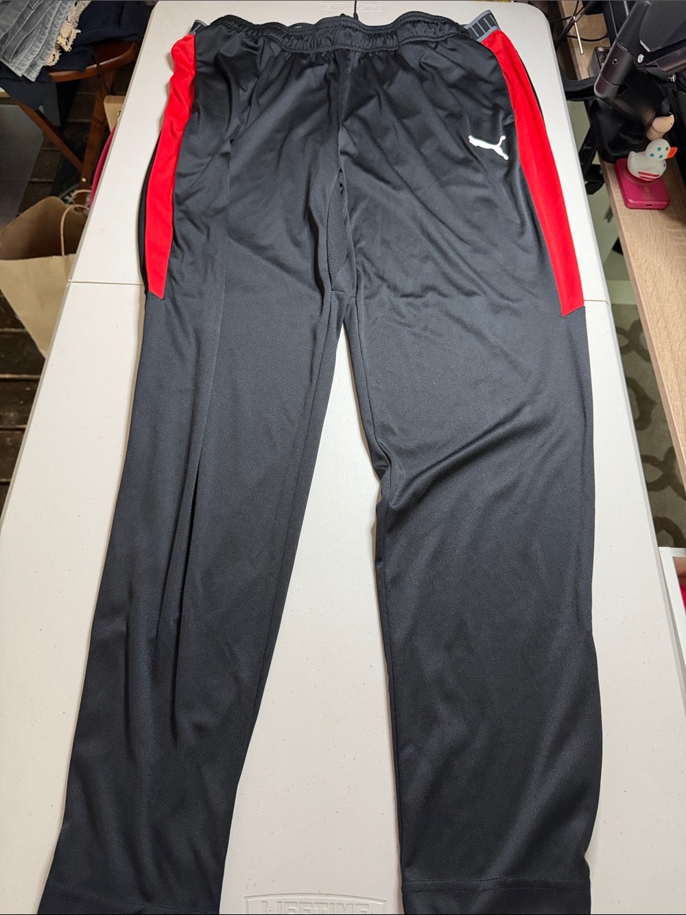 Puma Black Track Pants with Red Side Stripes